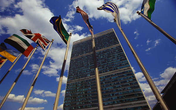 Flags flying outside the UN building at New York